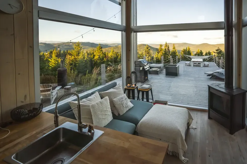 The view of the living and deck from the kitchen.