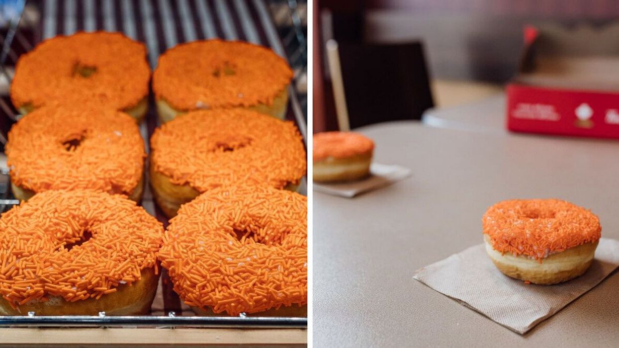 Tim Hortons vanilla dip-style donuts with orange sprinkles.