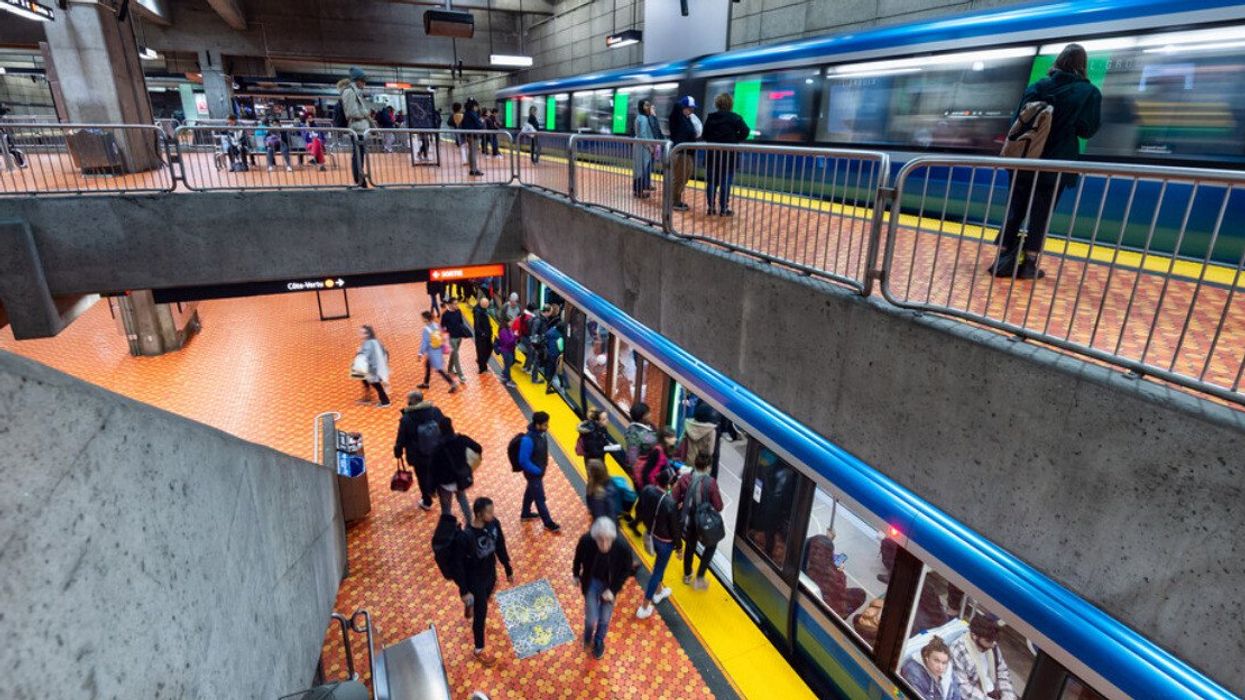 Two Subway trains at Lionel Groux Station.