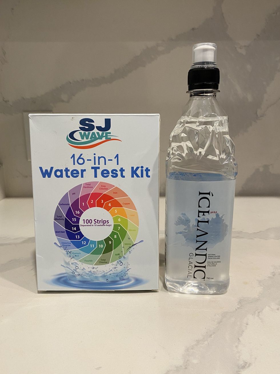 \u200bA bottle of Icelandic water and a 16-in-1 water test kit.