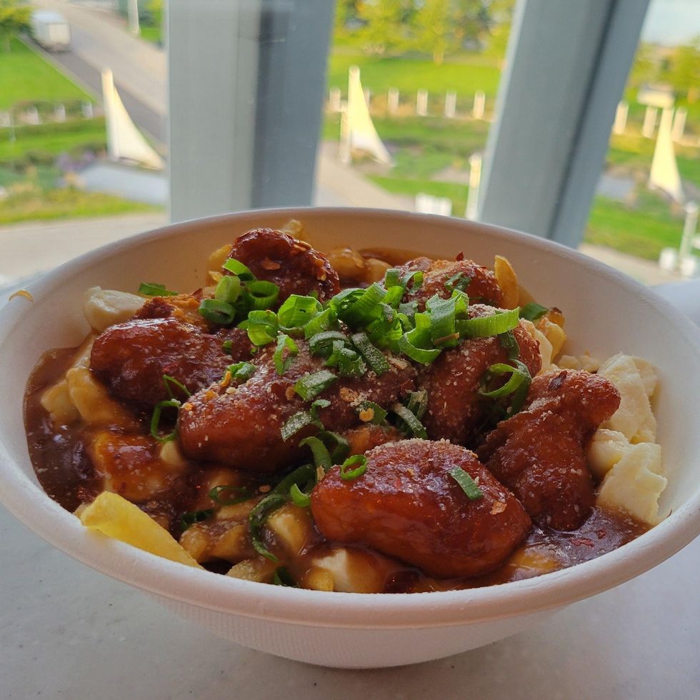\u200bA plate of General Tao poutine at the Montreal Casino.