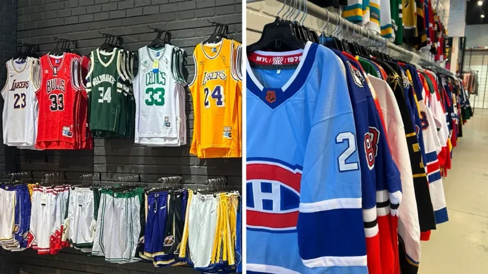 \u200bA sports sale warehouse in Montreal with sports jerseys, matching sets and baseball caps for sale.
