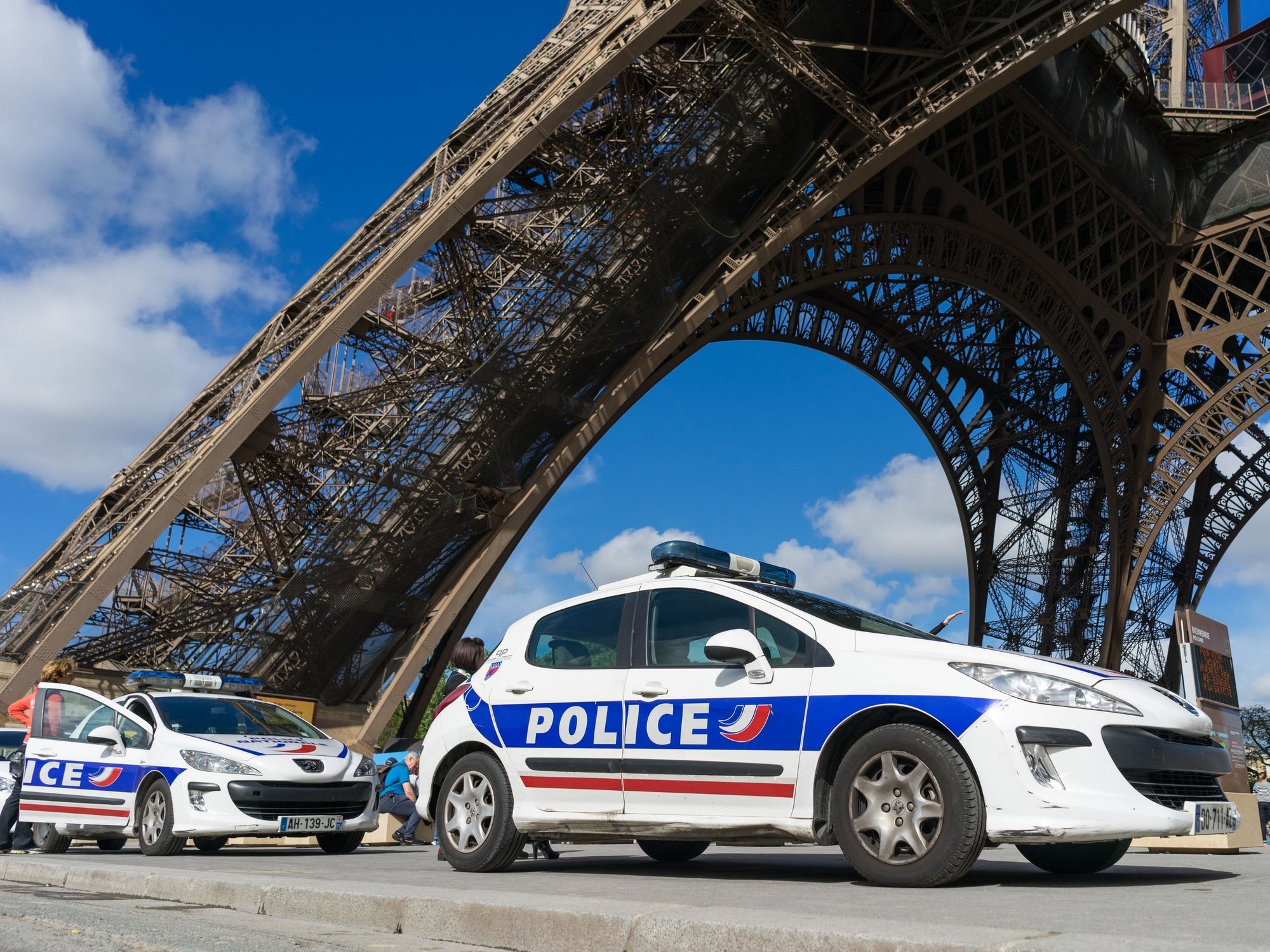 \u200bFrench police cars under the Eiffel Tower.