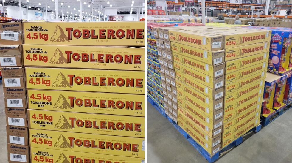 \u200bGinormous bars of Toblerone are stacked 11 high on a pallet.
