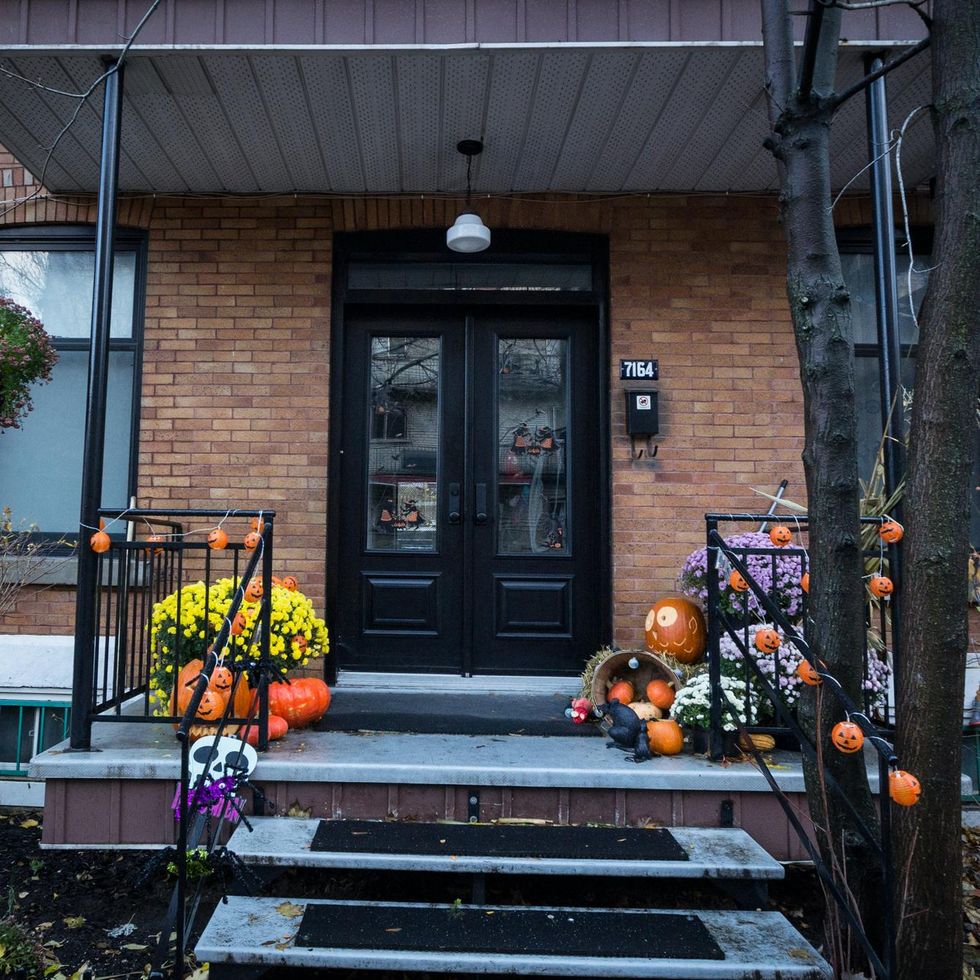\u200bHalloween deco outside a Montreal home.