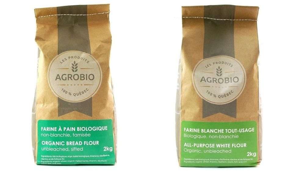 \u200bLes Produits Agrobio white bread flour, organic, unbleached packaged in paper bags with green details.