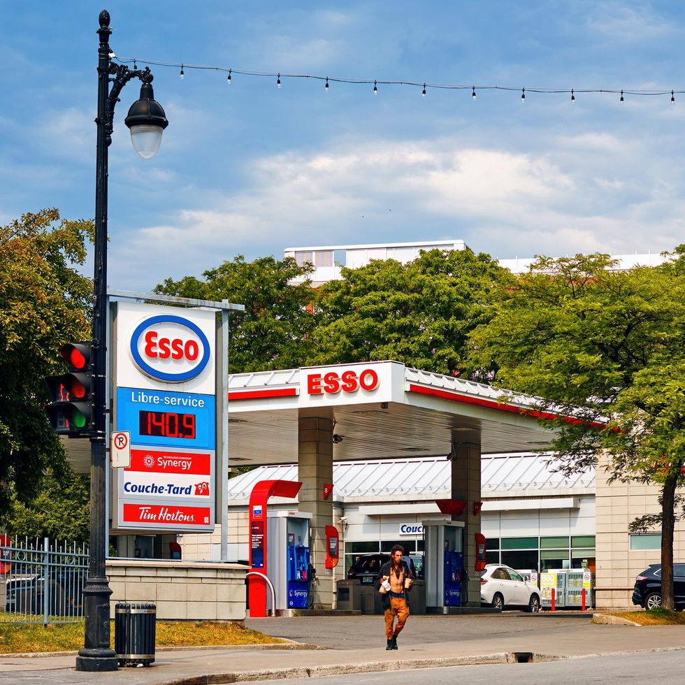 \u200bSomeone walks away from a gas station in Montreal.