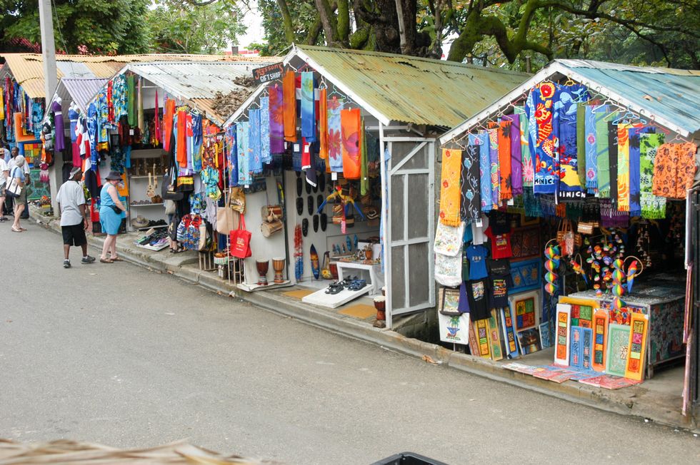 \u200bStalls with colourful souvenirs at Sosua, Dominican Republic.