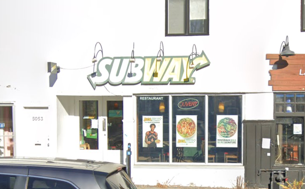 \u200bThe exterior of a Subway restaurant on a busy street in Montreal.