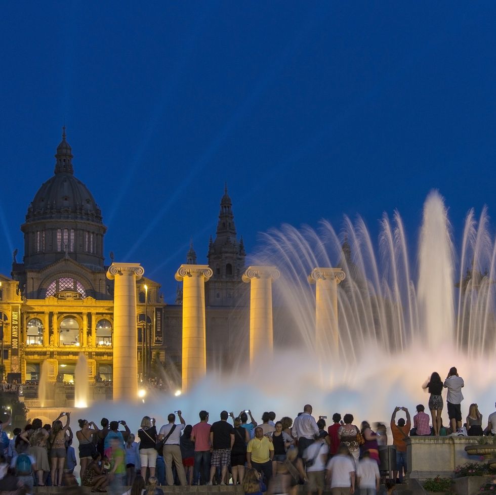 \u200bTourists at Barcelona's Font Magica outside the Museu Nacional dArt de Catalonia.