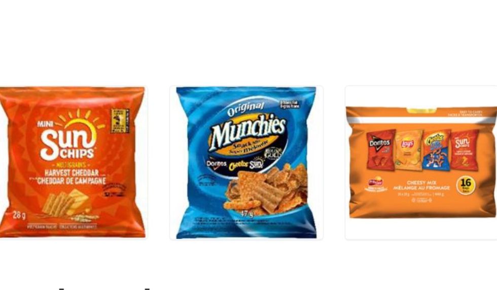 \u200bVarious Frito Lay-brand chips including Sun Chips, Munchies Mix, and the variety pack of smaller bags.