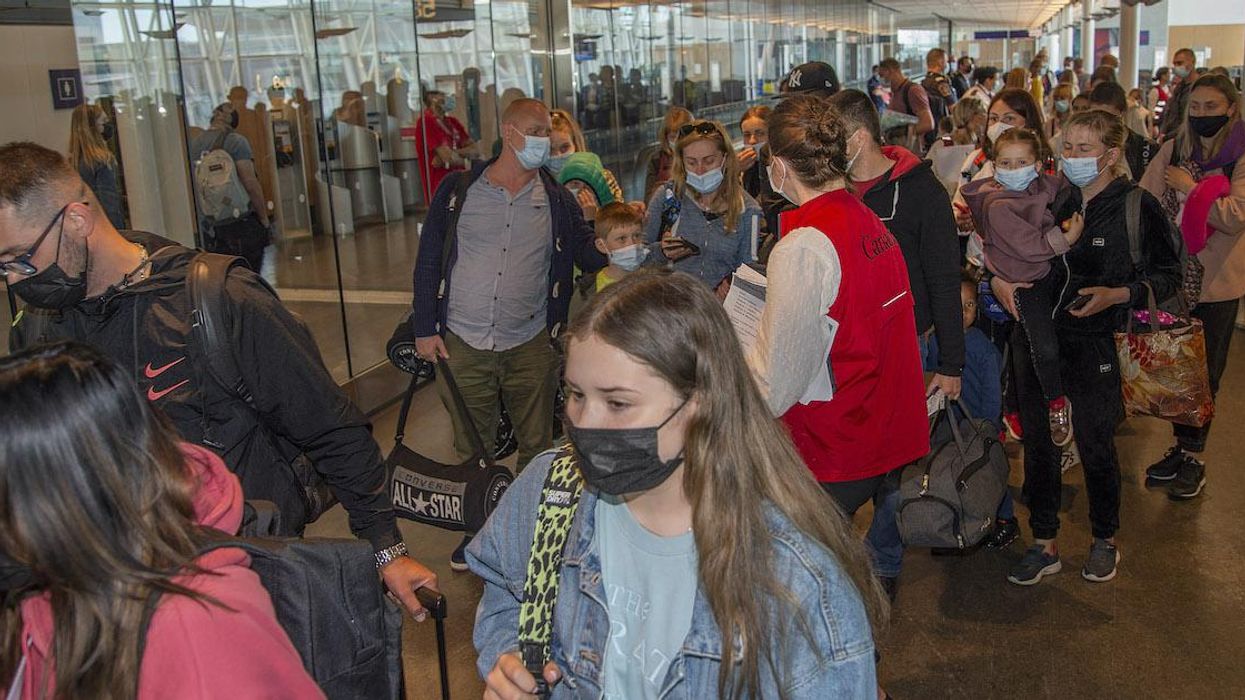 Ukrainians on a federal charter flight from Poland arrive in Montreal.