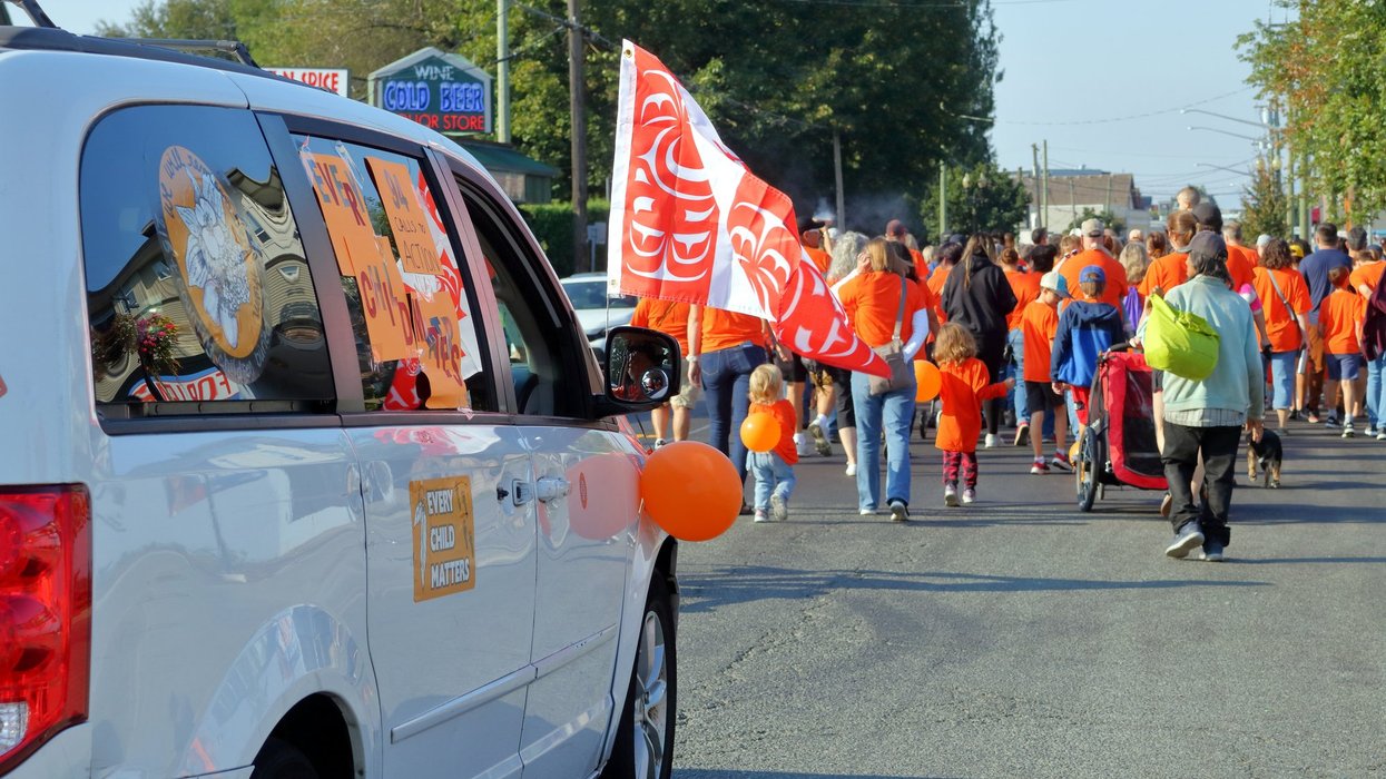 vehicle with native symbols follows an indigenous march in Chilliwack, BC, Canada on September 30, 2022 that was part of the annual Truth and Reconciliation Day events.