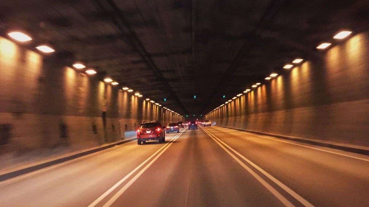 Vehicles move through the Ville-Marie Tunnel under downtown Montreal.