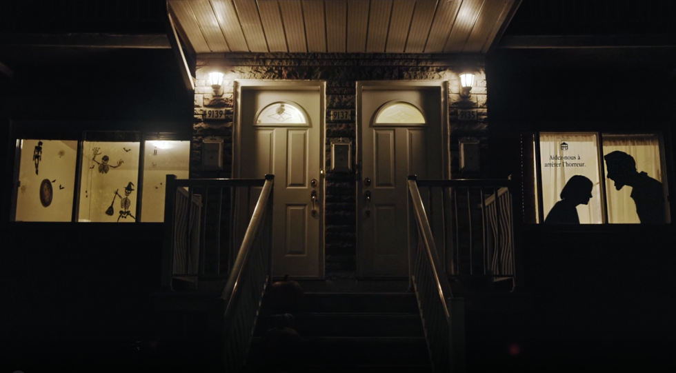 Vignette showing a domestic violence scene in the window of a Montreal home.