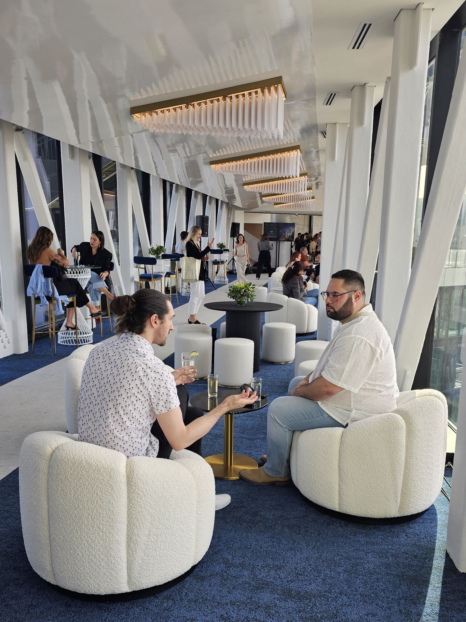 Will and Mike seated on the Maestria skybridge.